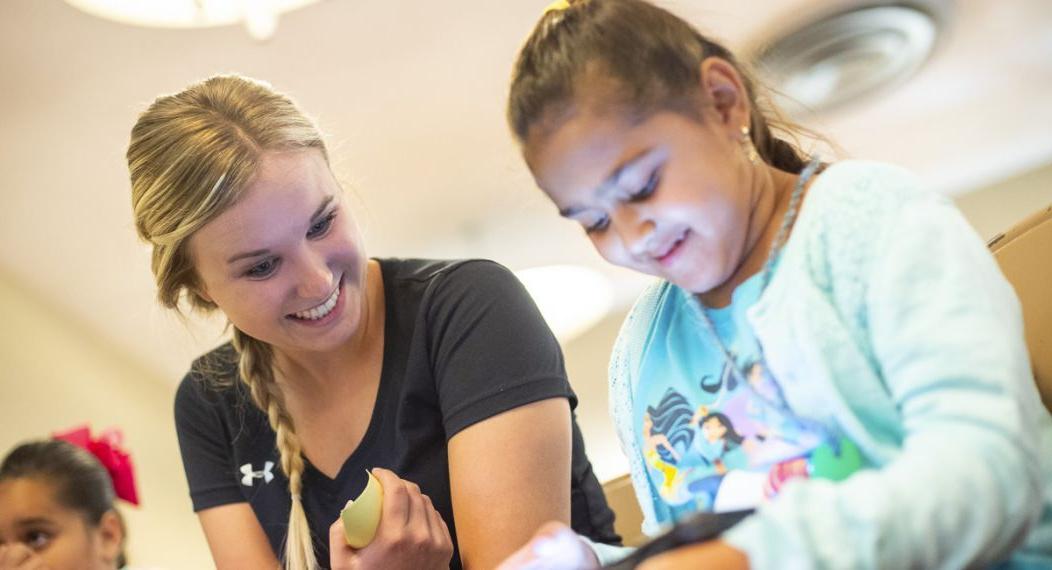 student with child patient